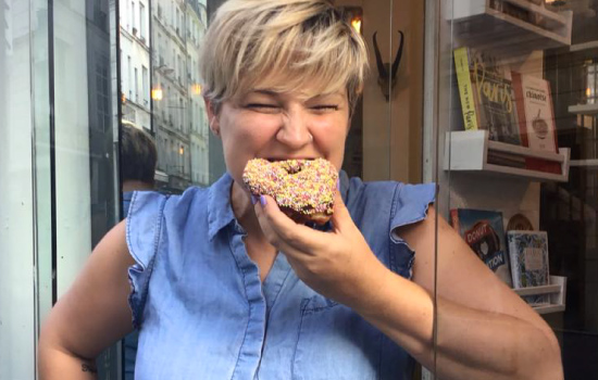 Amanda Bankert eating a delicous doughnut