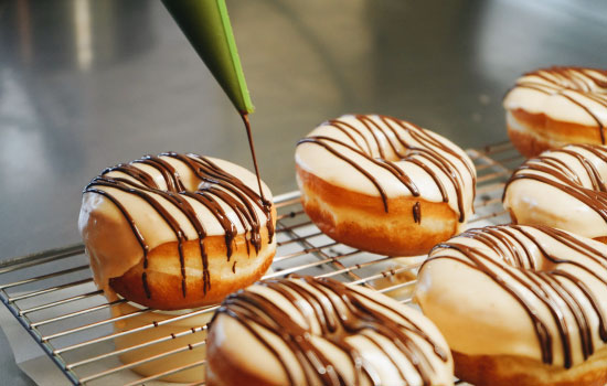 Freshly chocolate iced doughnuts